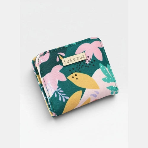 tuá e muá Kyla mini wallet with a floral print in green, pink, yellow, and purple. Features a gold-tone logo tag.
