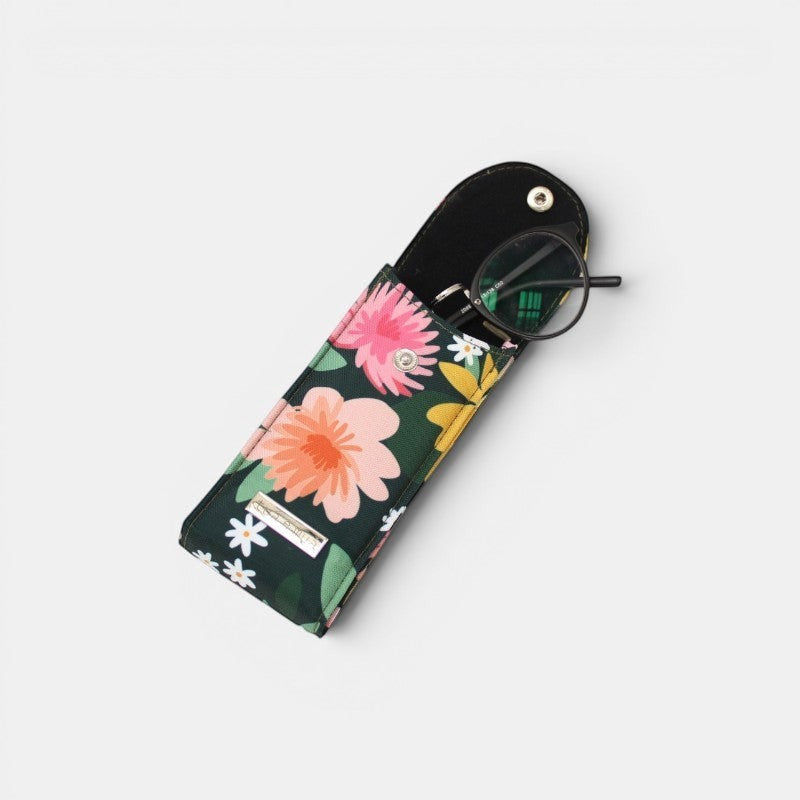 Portagafas Leonora de tuá e muá con estampado floral en lona impermeable y forro de algodón suave. Cierre de broche.